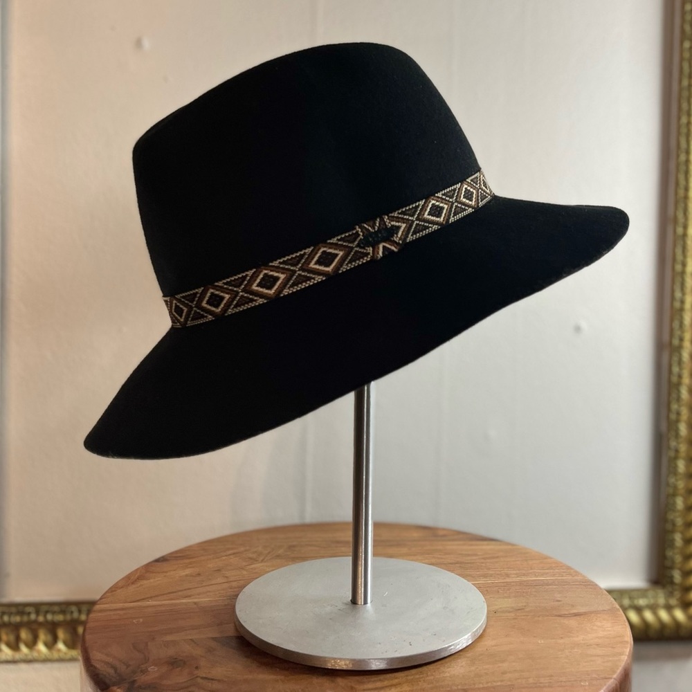 Woman’s black brim hat designer CC